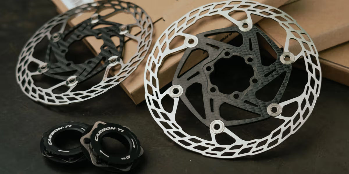 Copple Carbon-Ti X-Rotor SteelCarbon 3 semi-floating disc brake rotor, featuring a carbon fiber inner spider and steel braking surface.