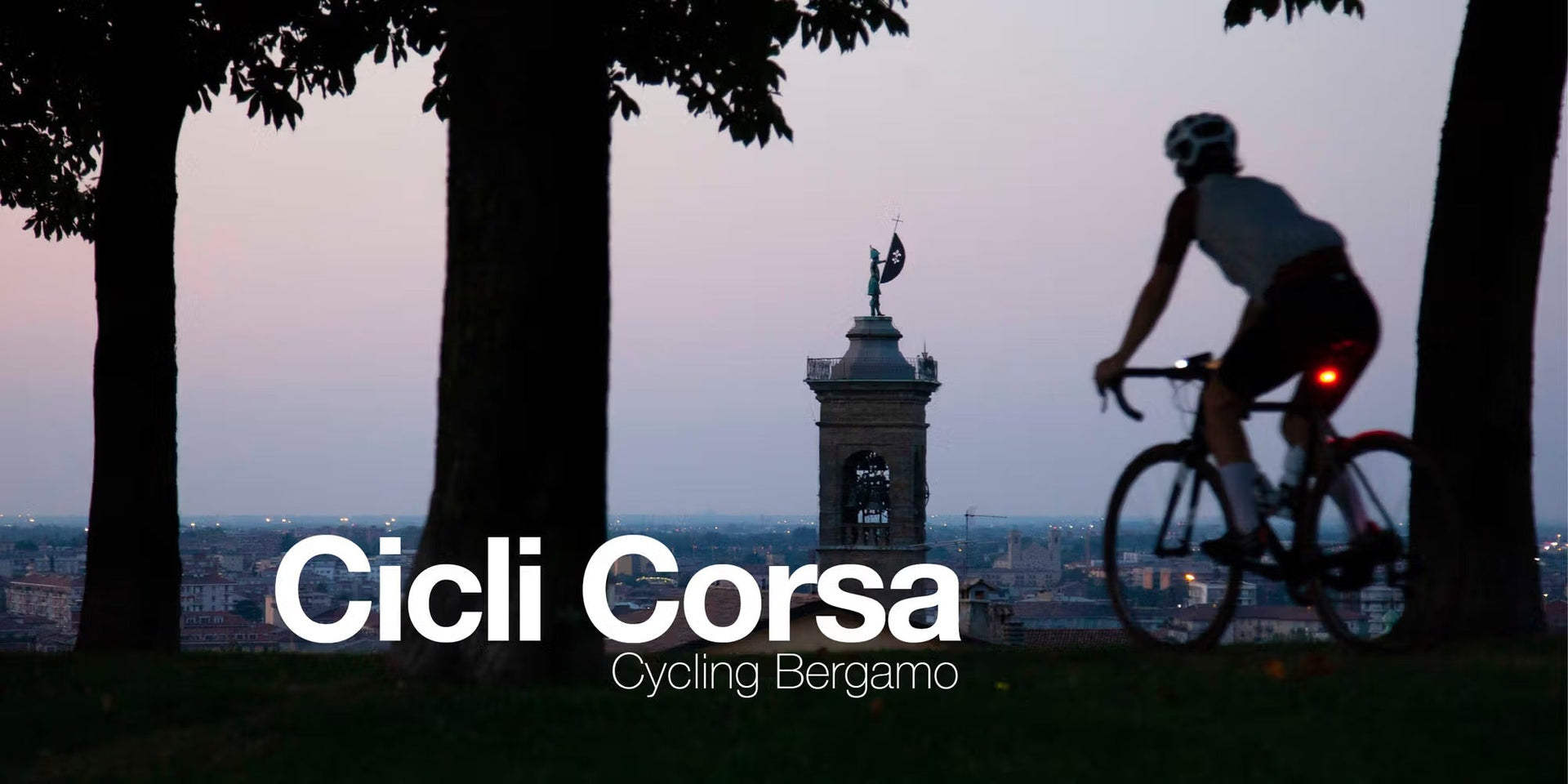 Cyclist riding on a scenic road in Bergamo. Cycling in Italy.