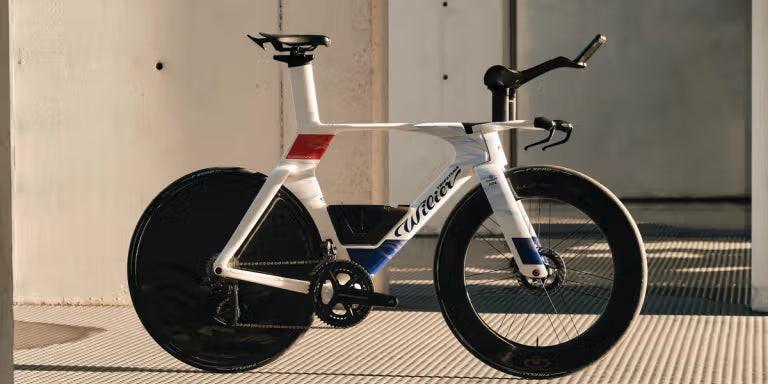 Side view of the Wilier Supersonica SLR time trial bike, showcasing its aerodynamic design for the World Tour.