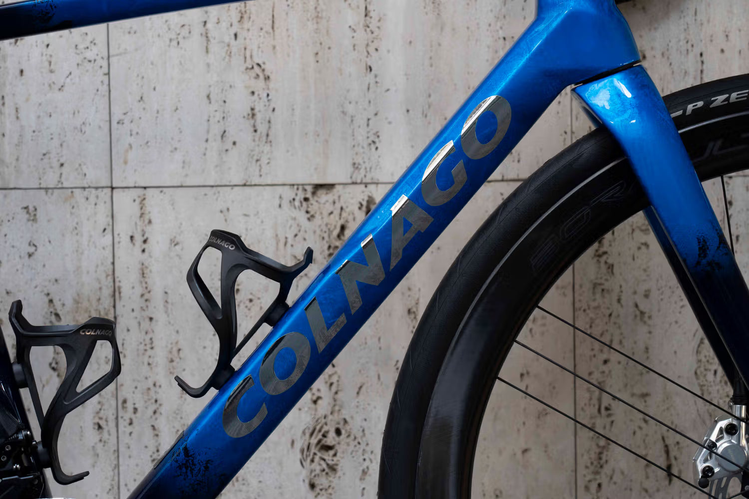 Colnago branding on the down tube highlighting the premium HSBL blue and raw carbon finish on the C68 complete bicycle by Cicli Corsa.