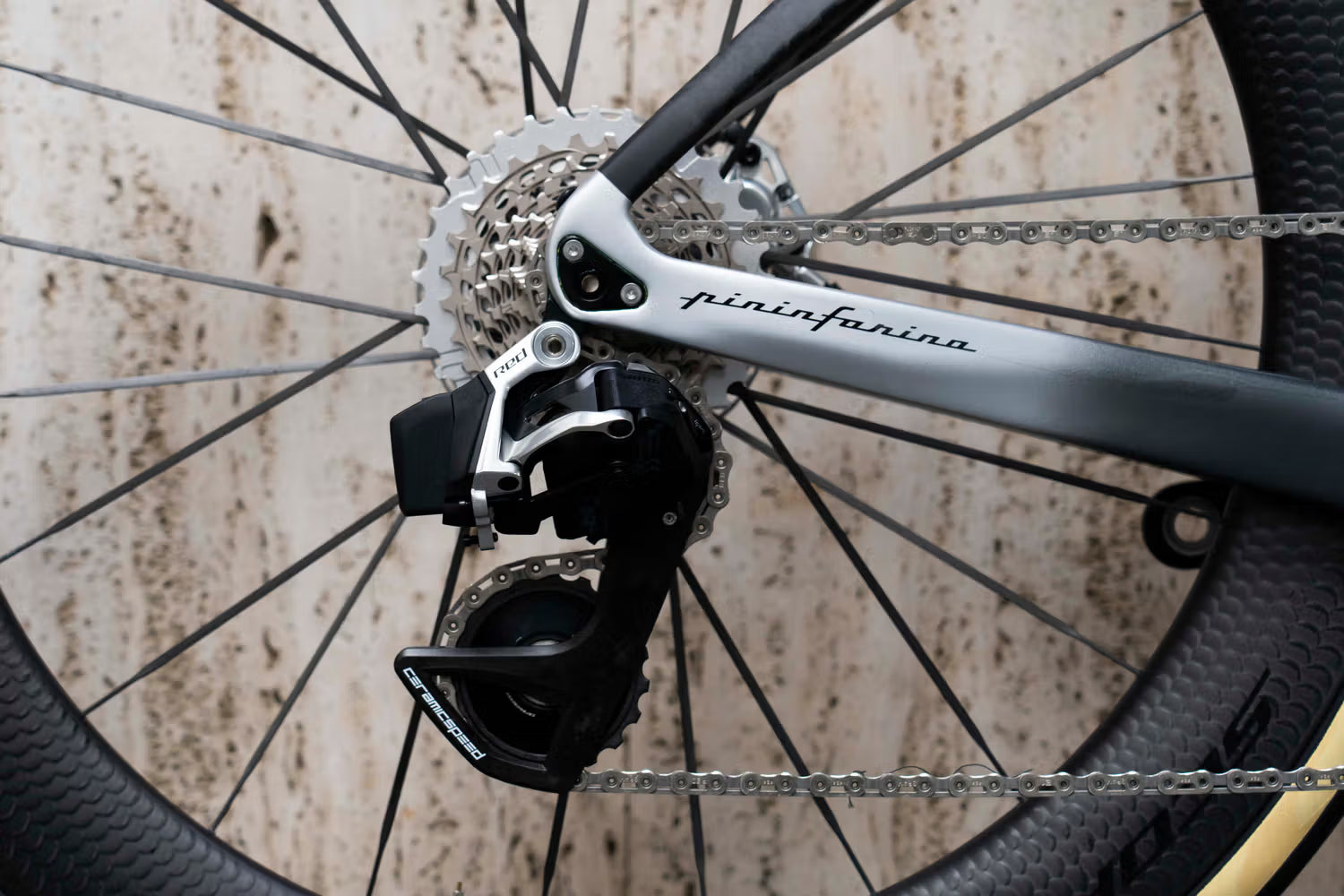 SRAM Red E1 wireless rear derailleur equipped with a CeramicSpeed OSPW carbon oversized pulley wheel system on the De Rosa 70 by Cicli Corsa.
