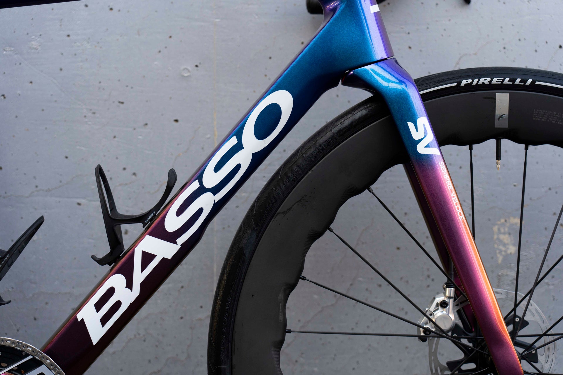 Basso branding on the down tube highlighting the premium Viola Galaxy chameleon paint finish on the Diamante SV complete bicycle by Cicli Corsa.