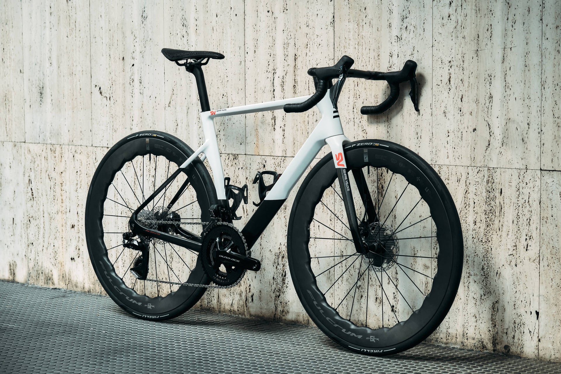 Front view of the Basso Diamante SV Sempre Veloce premium aerodynamic road racing complete bicycle, custom dream bicycle build by Cicli Corsa.