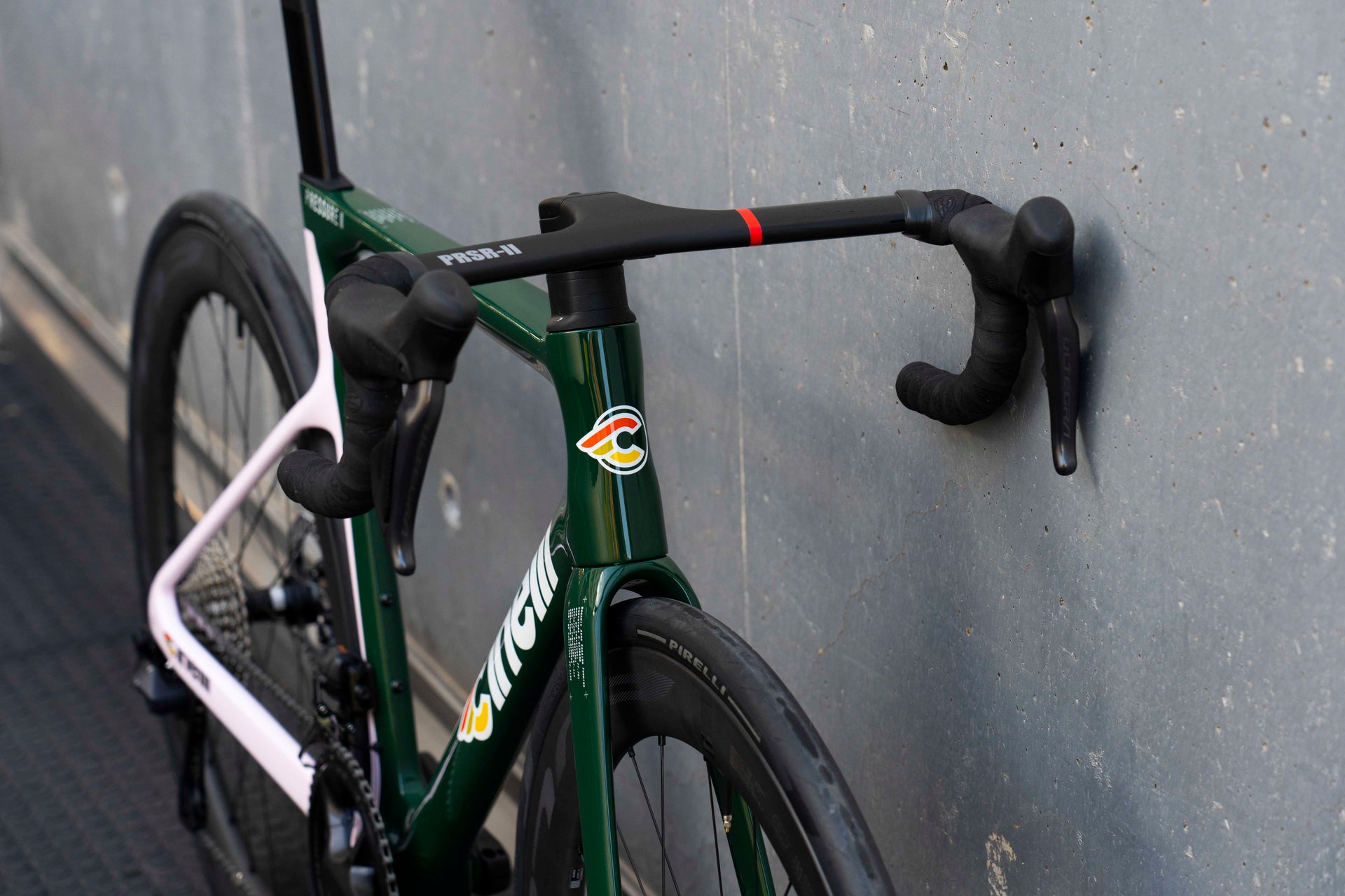 Front Cinelli Pressure II aero road bicycle in racing green with Shimano Ultegra Di2, a custom bicycle build by Cicli Corsa.