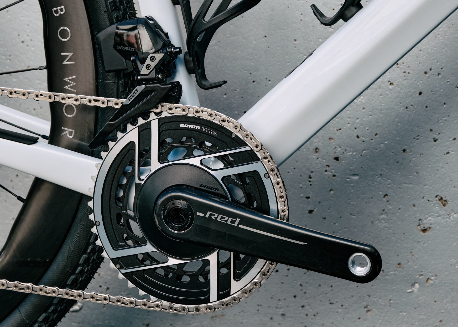 SRAM Red drivetrain detail on the Colnago C68 custom gravel complete bicycle by Cicli Corsa.