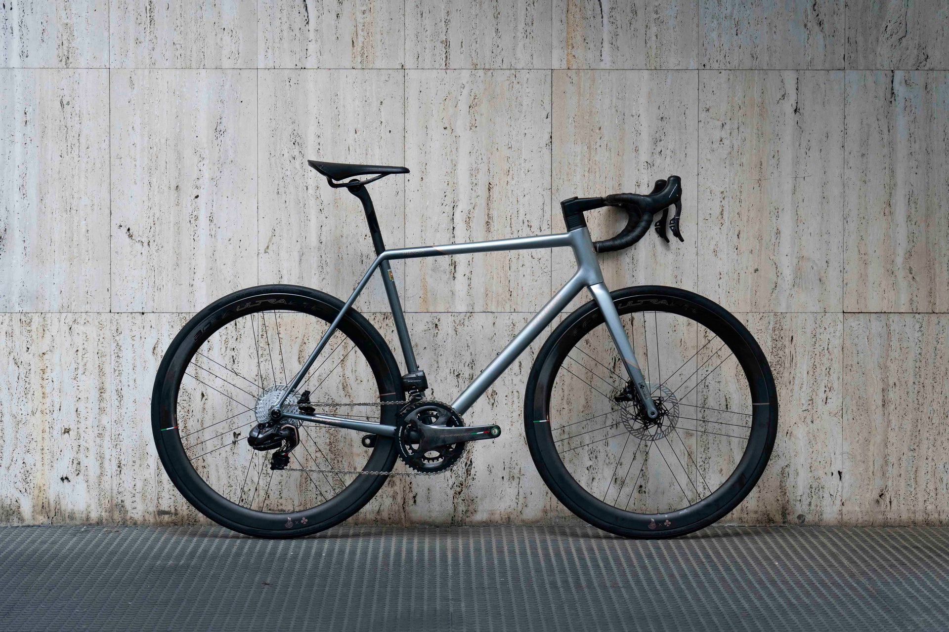 Drive side view of the limited edition Colnago Steelnovo custom steel complete bicycle with Campagnolo Super Record Wireless and Bora Ultra WTO wheels, built by Cicli Corsa.