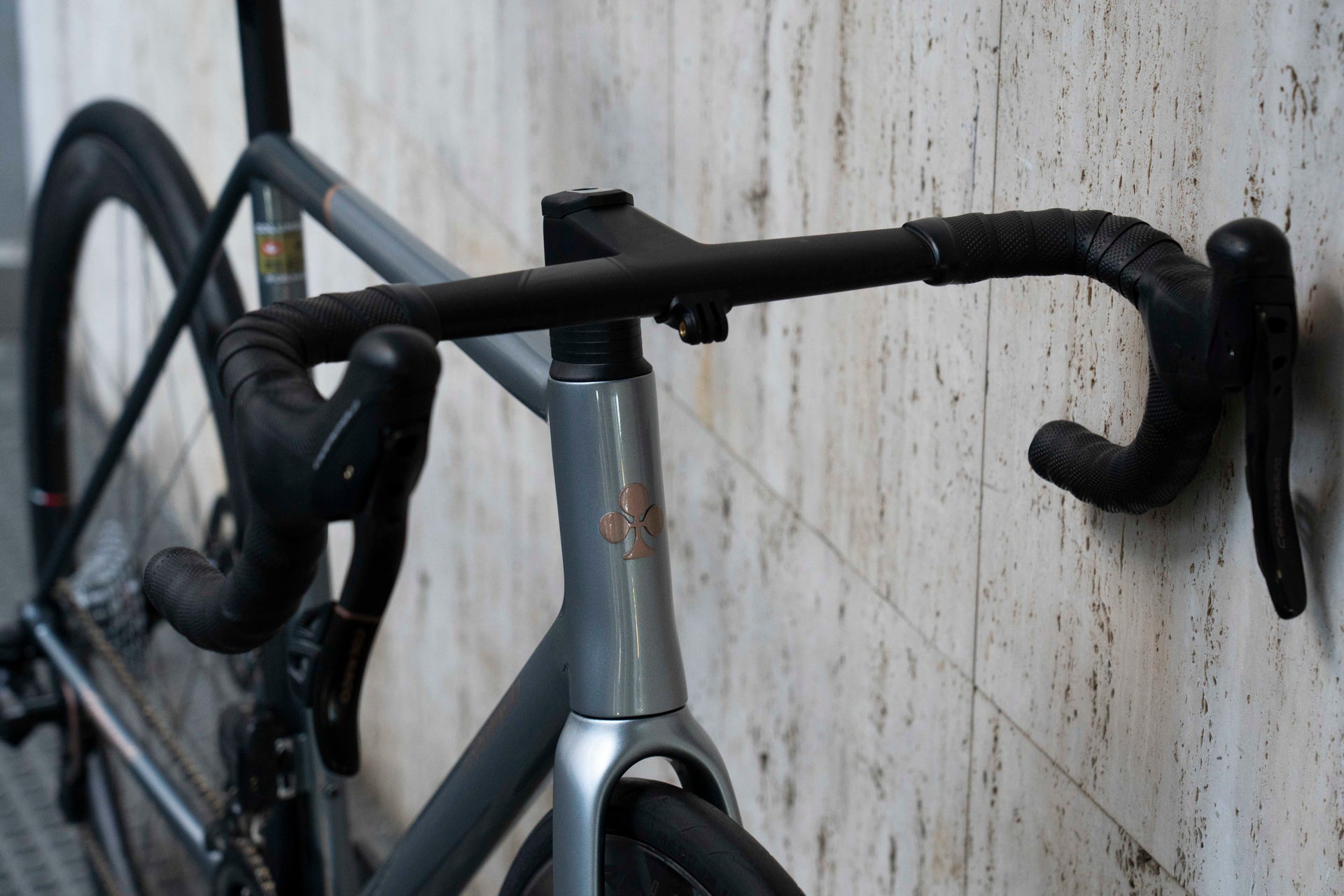 Close-up of the premium integrated handlebar and custom cockpit setup on the limited edition Colnago Steelnovo complete bicycle by Cicli Corsa.
