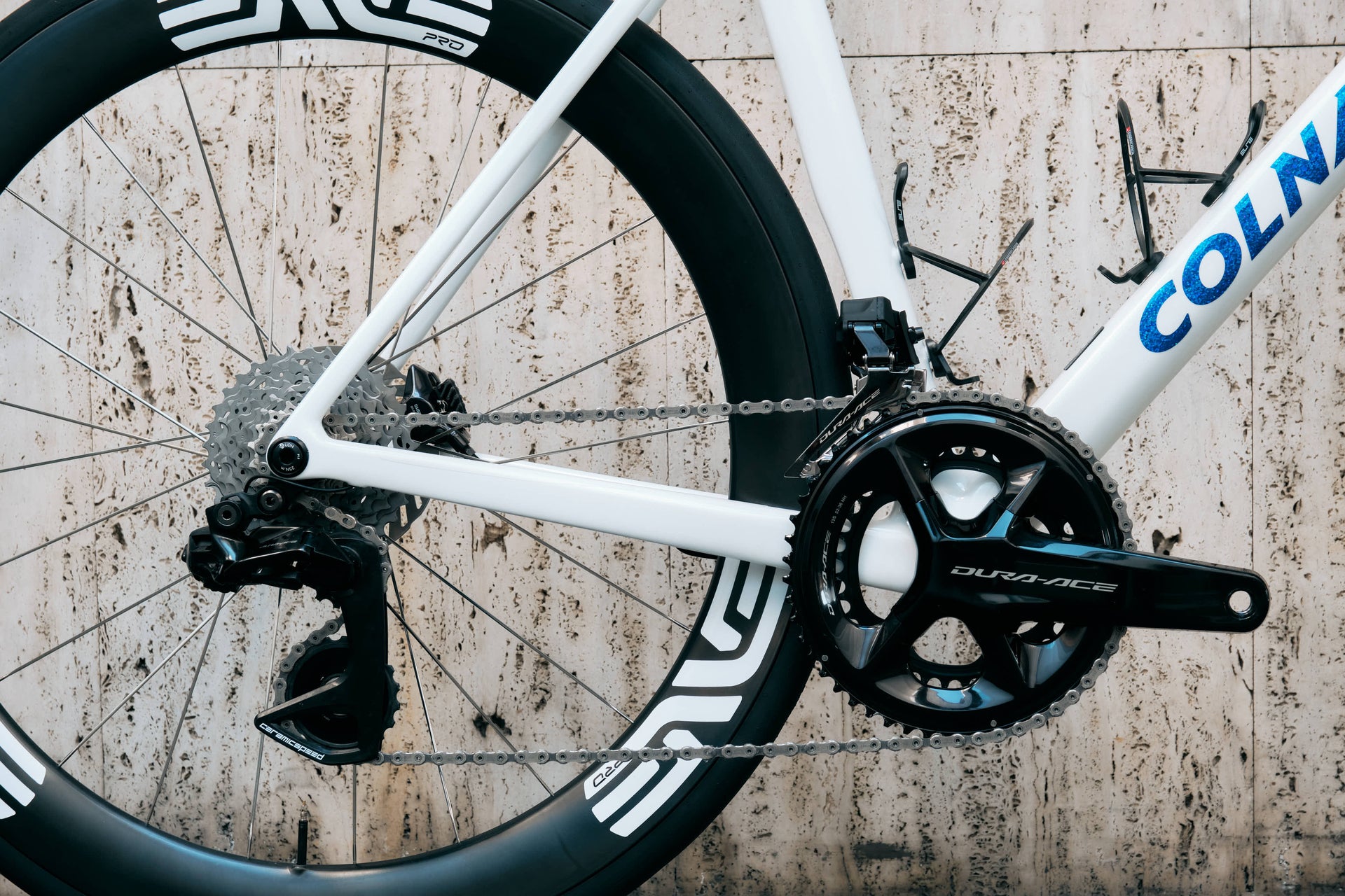 Premium multi-speed carbon road crankset close-up on the Colnago V5Rs VRWB complete bicycle by Cicli Corsa.