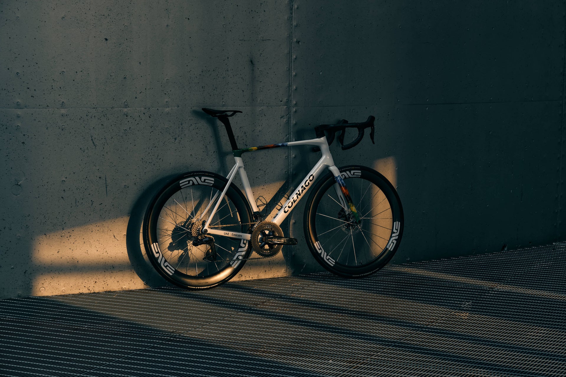 Rear view of the Colnago V5Rs custom aero road complete bicycle in official team VRWC livery, tailor-made by Cicli Corsa.