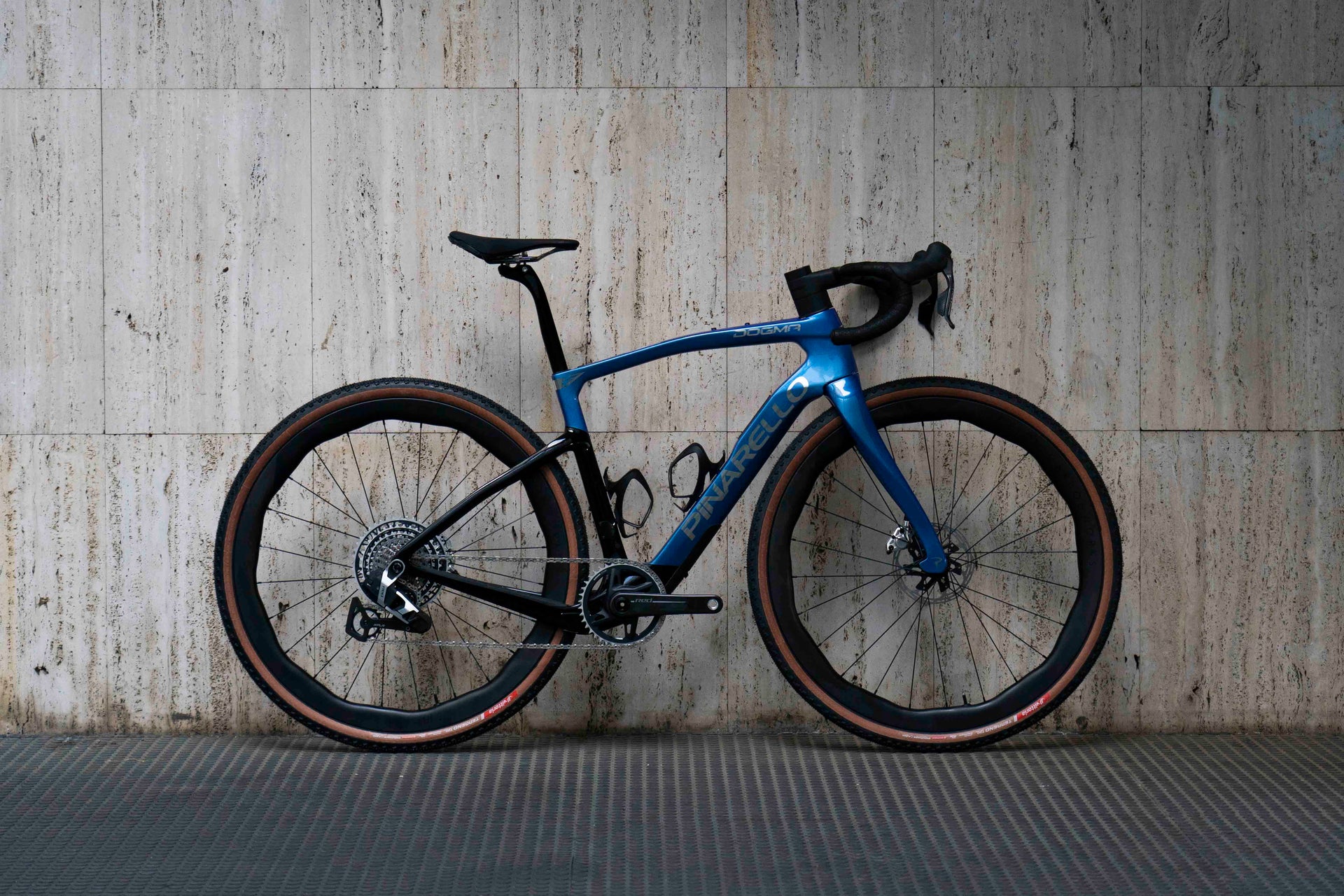 Drive side view of the Pinarello DOGMA GR Luxter Blue complete bicycle, custom built by Cicli Corsa.