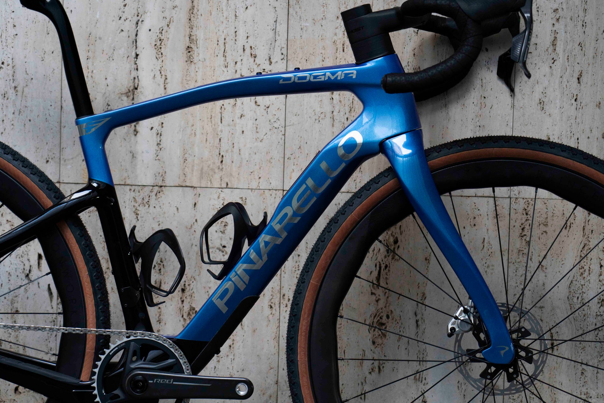 zoomed Drive side view of the Pinarello DOGMA GR Luxter Blue complete bicycle, custom built by Cicli Corsa.