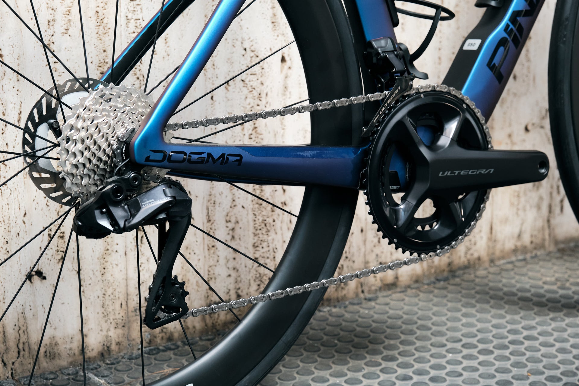 Shimano Ultegra Di2 wireless electronic rear derailleur and cassette on the Pinarello Dogma F complete bicycle by Cicli Corsa.