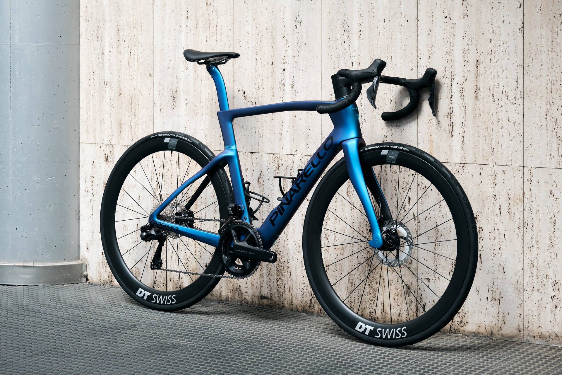 Front view of the Pinarello Dogma F Luxter Blue premium road racing complete bicycle, custom aero bicycle build by Cicli Corsa.