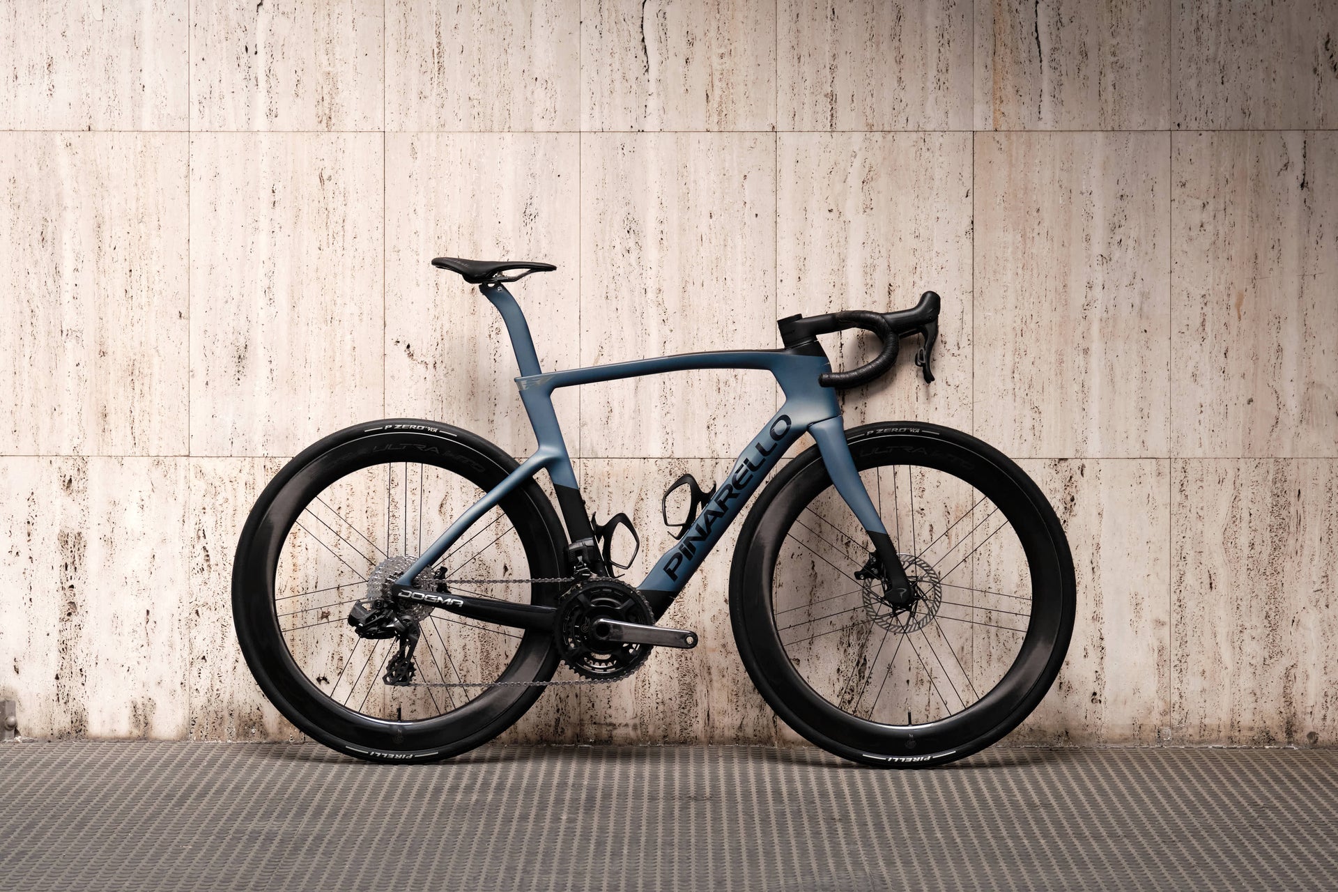 Drive side view of the Pinarello Dogma F Luxter Grey Matte complete bicycle with Campagnolo Super Record and Bora Ultra WTO 60 Chrome wheels, custom built by Cicli Corsa.