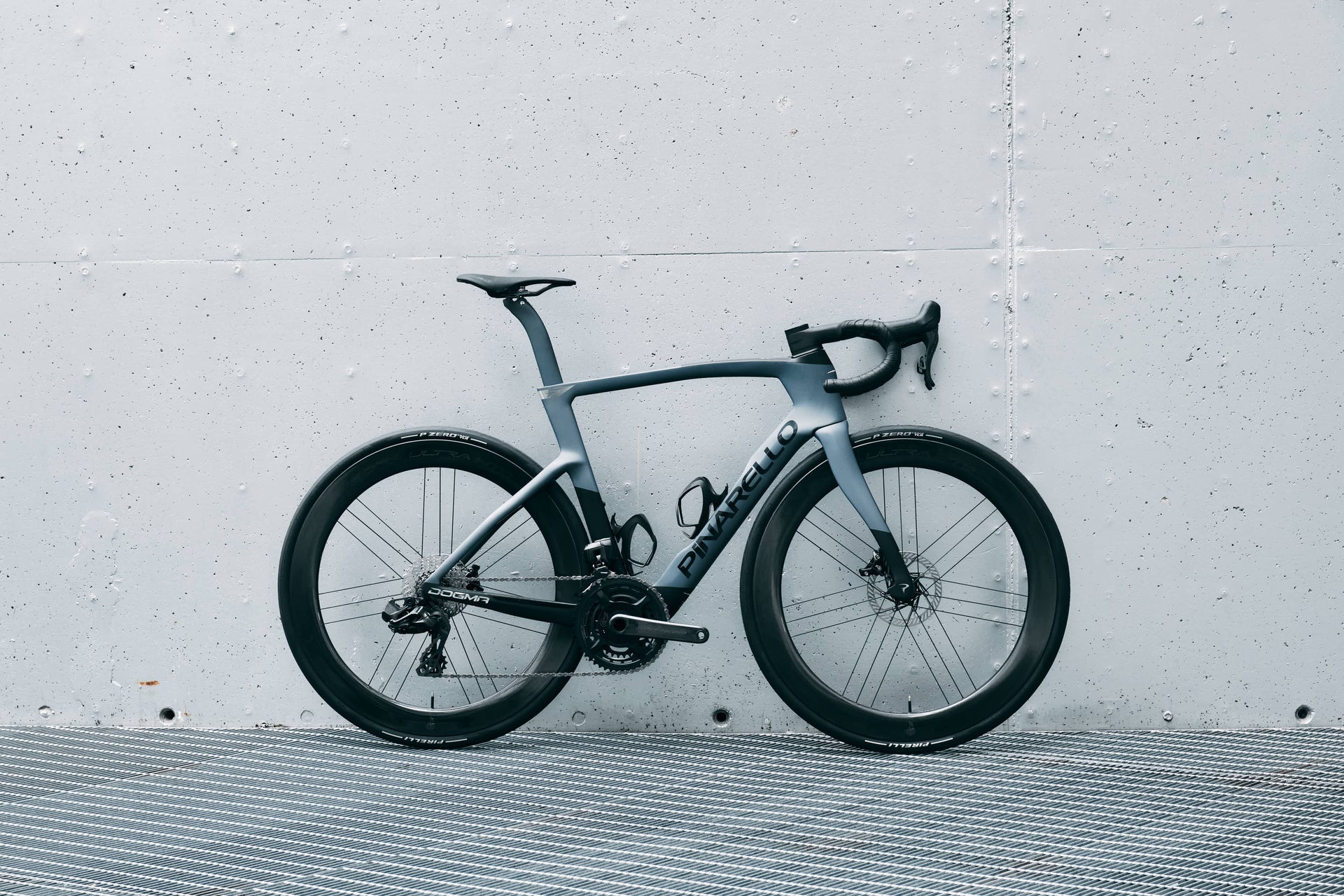 Campagnolo hydraulic disc brake caliper on the aerodynamic Onda carbon fork of the Pinarello Dogma F complete bicycle by Cicli Corsa.