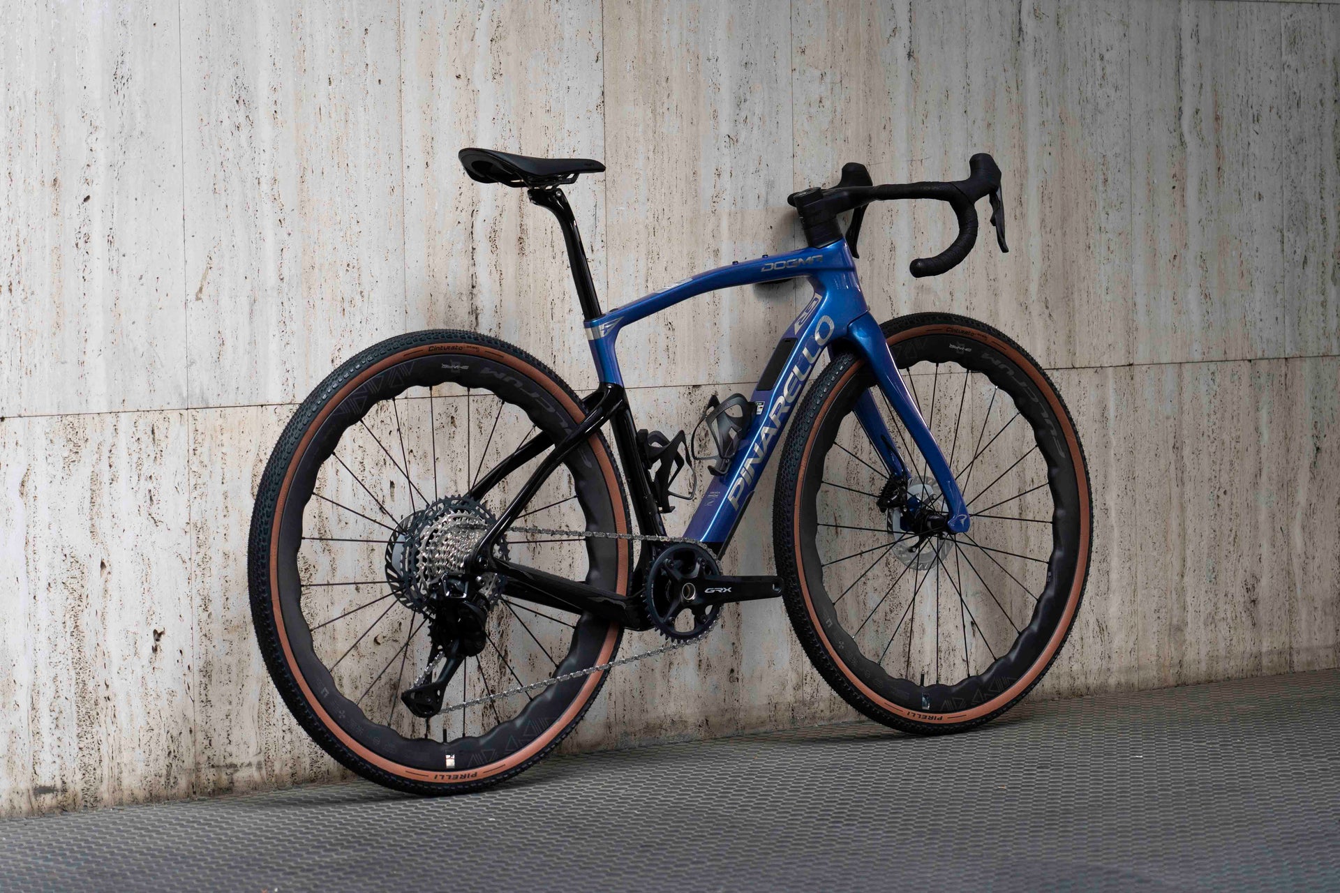 Rear view of the Pinarello Dogma GR custom all-road complete bicycle with 12-speed Shimano GRX drivetrain, tailor-made by Cicli Corsa.