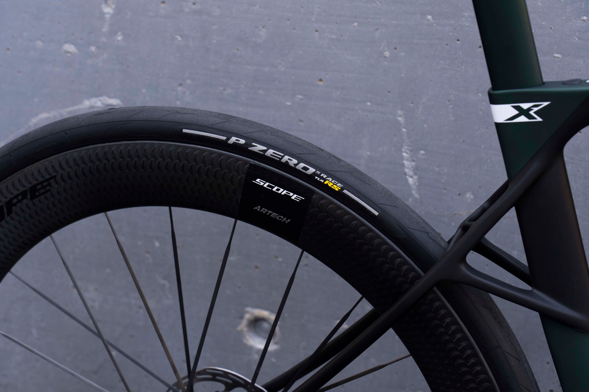 Scope Artech 6 carbon wheels with 3D-printed biomimetically designed hubs on the Pinarello Dogma X complete bicycle by Cicli Corsa.