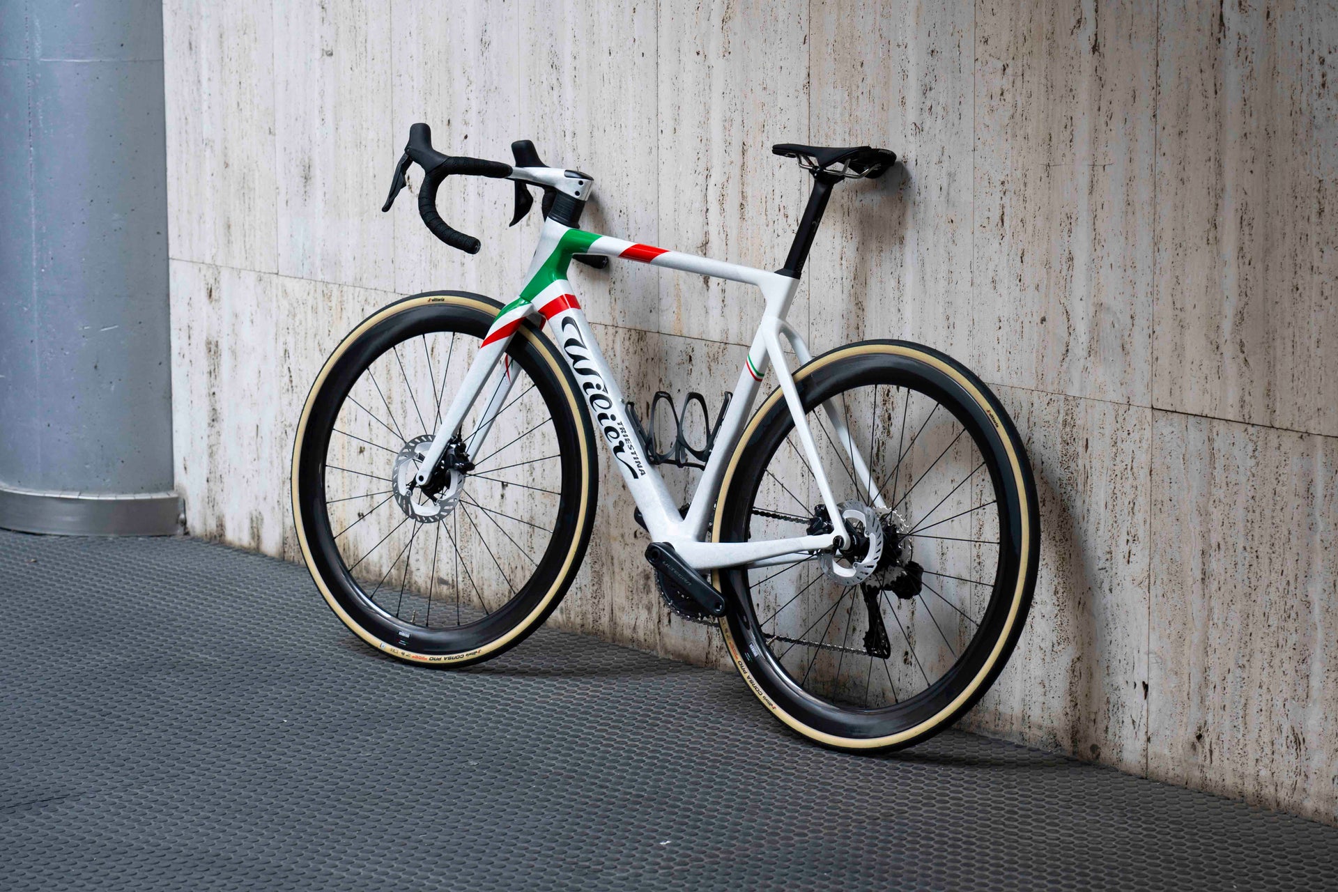 Rear view of the Wilier Filante SLR custom aero road complete bicycle in official Italian Champion graphics, tailor-made by Cicli Corsa.