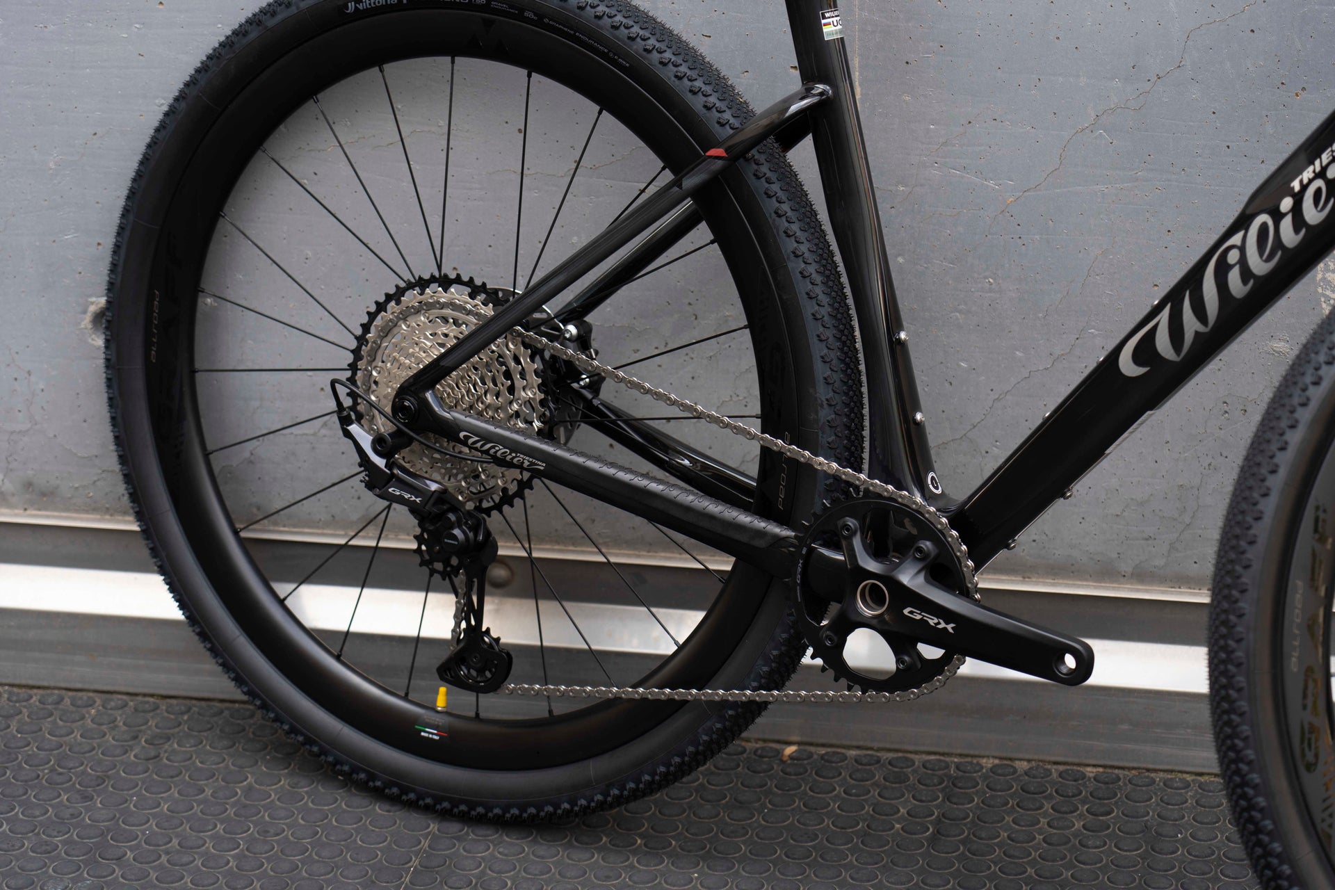 Shimano GRX 1x12-speed single chainring gravel crankset close-up on the premium Wilier Triestina Rave SLR complete bicycle by Cicli Corsa.