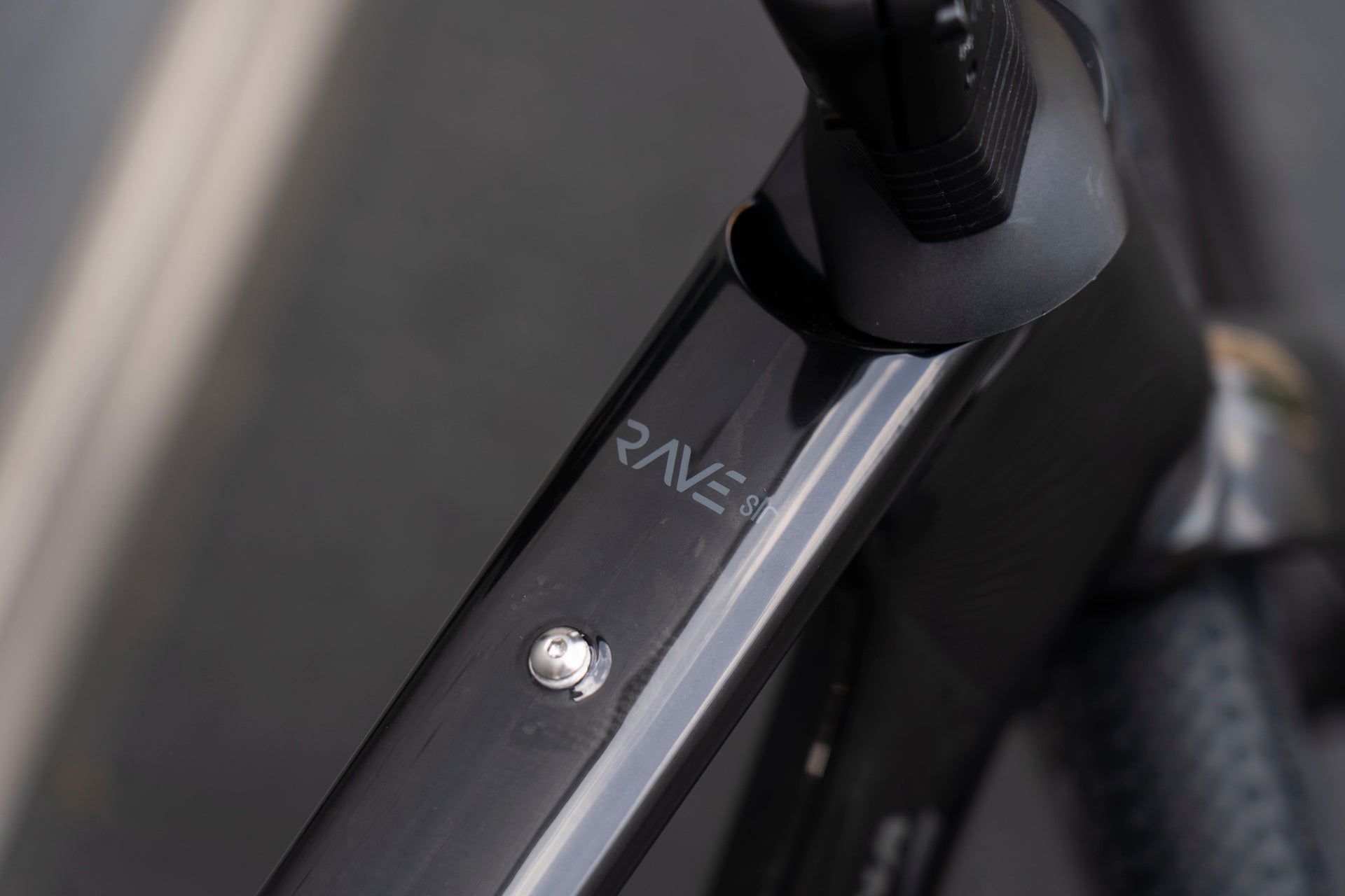 Wilier Triestina branding on the down tube highlighting the premium Glitch Black paint finish on the Rave SLR complete bicycle by Cicli Corsa. Logo Rave