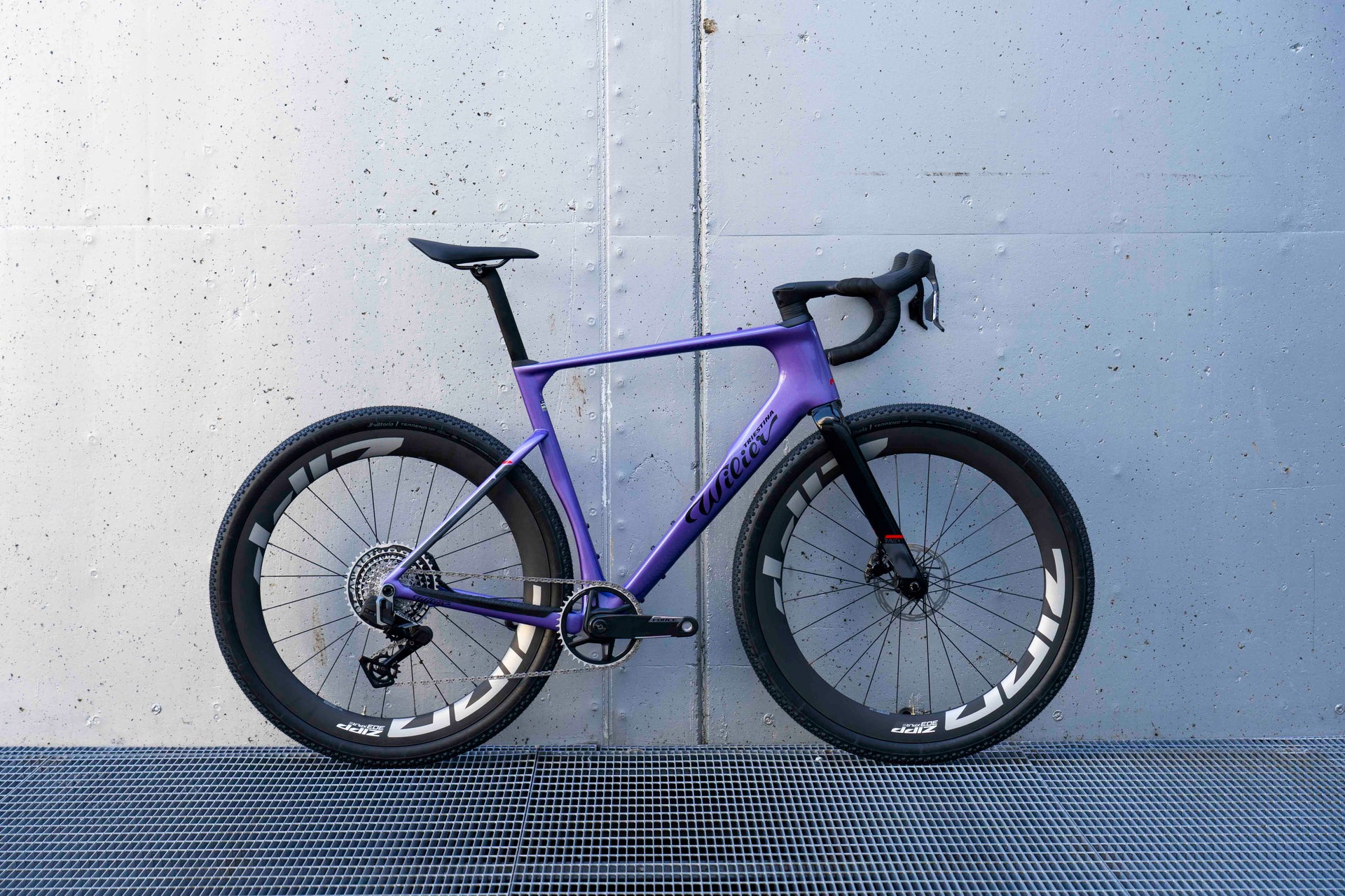 Drive side view of the Wilier Rave SLR Neon Purple complete bicycle, custom built by Cicli Corsa.